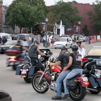 Festival attendees arranging parking at Lansing JazzFest 2010.